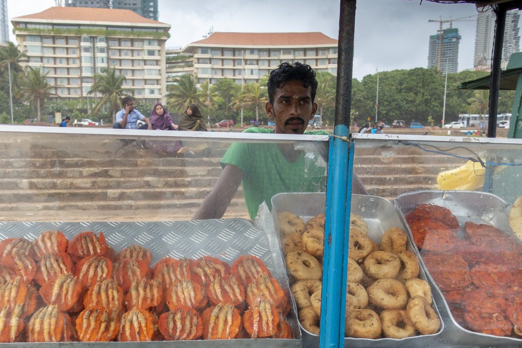Local man at street food stall