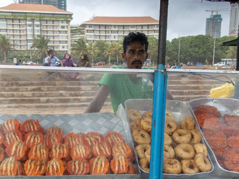 Local man at street food stall