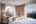 Bedroom with city views at Hotel des Arts