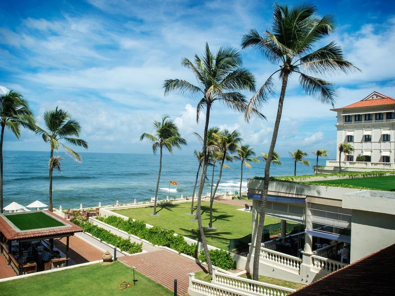 Galle Face Hotel with palm trees