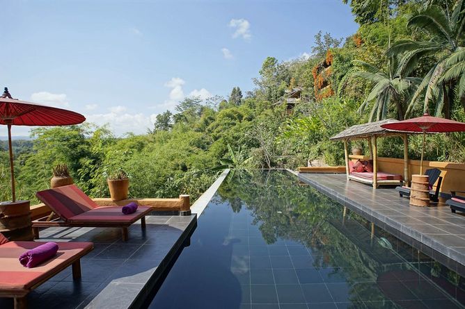 Infinity pool with mountain views
