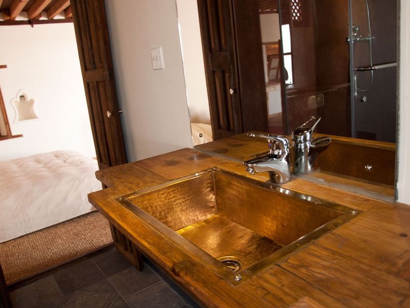 Wooden crafted sink at Inn Patan