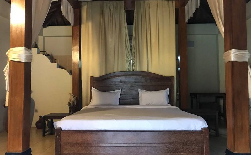 Double room with wooden furnishings