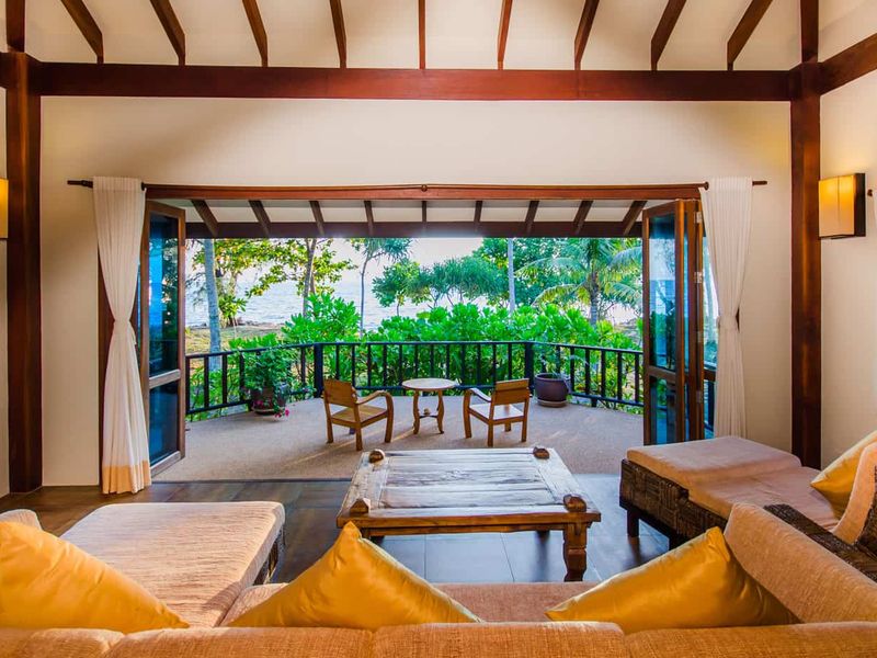 Seating area in villa with sea view at Koh Jum Beach Villas