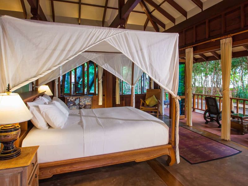 Double canopy bed at Koh Jum Beach Villas
