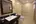 a bathroom with a mirror and sink