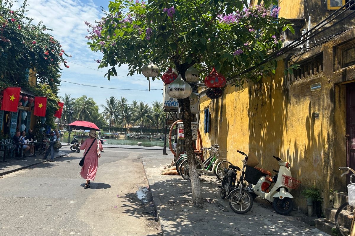 Guide walking through Hoi An