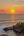a sunset over a body of water