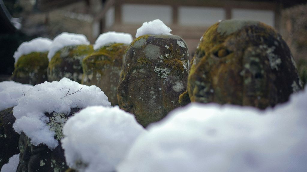 statues in the snow Japan