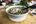 a bowl of soup with noodles and vegetables