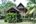 Wooden villa with trees at Bon Ton Resort