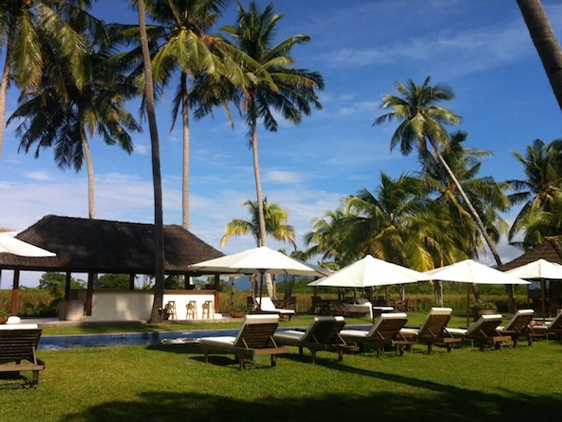 Pool with loungers at Bon Ton Resort