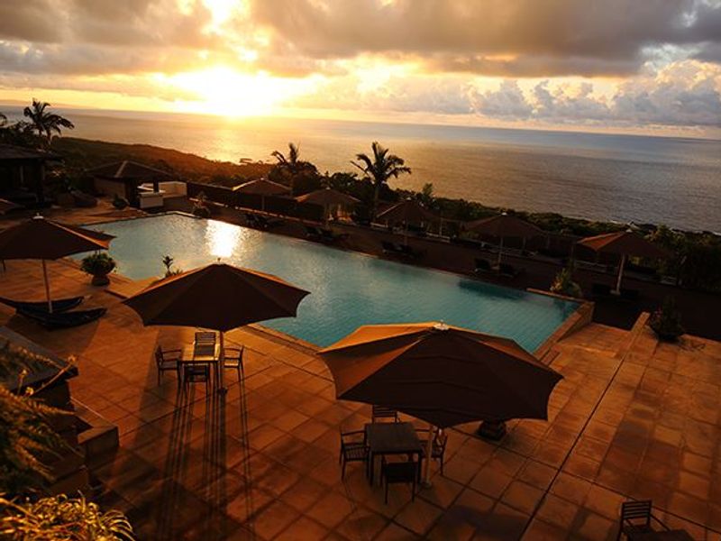 Pool at sunset at Sankara Hotel & Spa