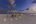 a beach with a gazebo and candles