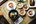 a table with bowls of food
