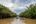 two people in canoes on a river