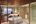 a bathroom with a bathtub and a glass shower