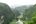 a river running through a valley with Tara River Canyon in the background