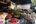 a market with many baskets of vegetables and fruits