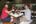a group of men sitting at a table with drinks