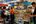 people in a market with food