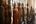 a row of statues in a room