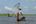 a man in a boat with a net