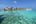 a group of houses on stilts over water