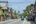 a street with buildings and cars