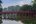 a red bridge over water