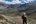 a person standing on a mountain