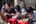 a group of people eating food