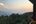a view of a mountain range from a balcony