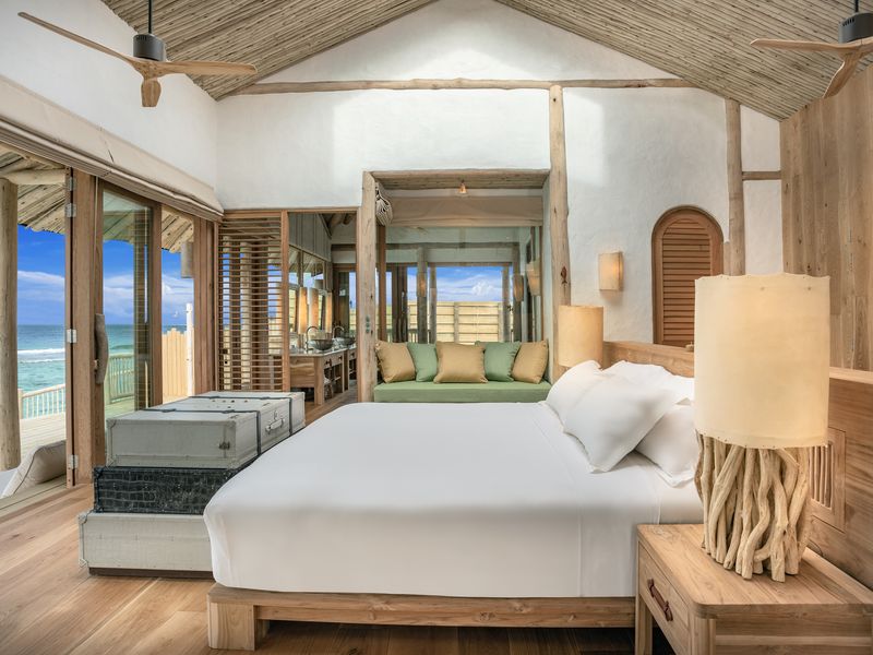 Bedroom water retreat with slide at Soneva Fushi