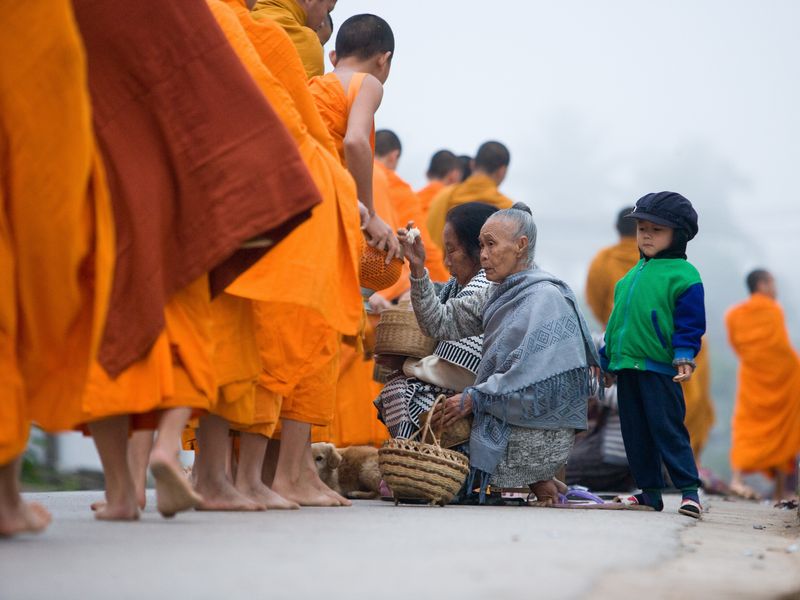 Luang Prabang - giving alms to monks