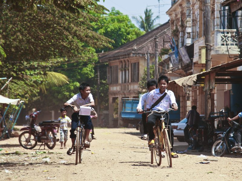 Boys on bikes in Cambodia