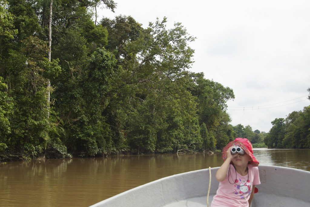 Girl on boat in Borneo