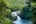 a waterfall in a forest