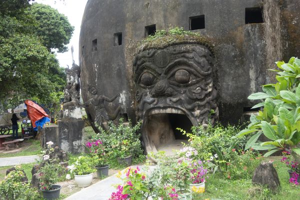 Hide between the Buddha Park statues near Vientiane