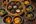a group of bowls of food on a table