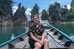a woman sitting on a boat