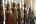 a row of statues in a room