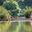 a couple of people in a boat on a river