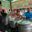 a man holding a bowl of food