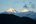 a mountain range with snow on top