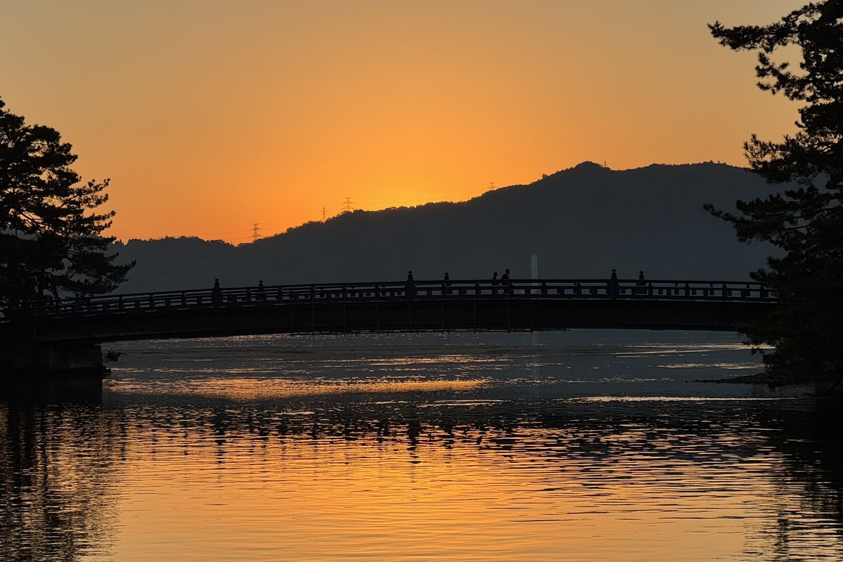 Sunset over a bridge in Amanohashidate