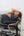 a man lying on a motorcycle