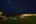 Swimming pool by night at Hoshinoya Taketomi Island