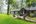 a house with a lawn and trees