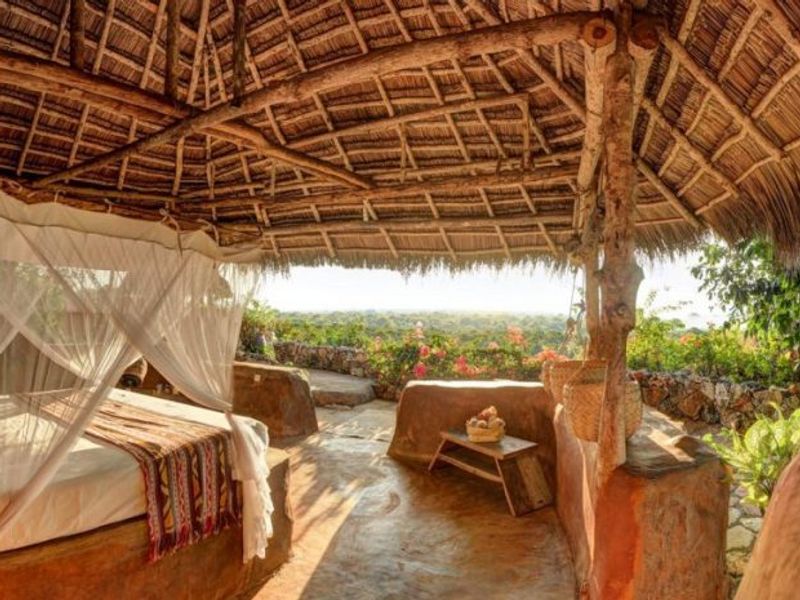 Open air bedroom at Utopia Surf & Yoga Eco Lodge